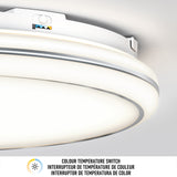 Close-up of a round ceiling light with a colour temperature switch. The switch has indicator lights and icons for different color temperatures. Text below describes the feature in English, French, and Spanish.