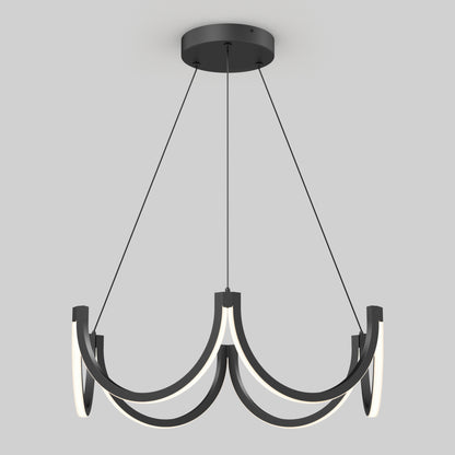 The Artika Adelia LED pendant light 5 CCT features a modern black design with three curved arms, integrated LED lights, and is suspended by three thin black cables against a plain light gray background.
