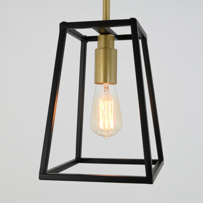 The Artika Carter 1-light pendant features a vintage-style exposed bulb in a black metal geometric frame with a gold socket, shown against a plain light background.