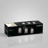 A rectangular black Artika box displays a three-light wall vanity fixture called Haze, with images of the modern light fixture featuring clear cylindrical glass shades and exposed bulbs on the packaging.