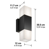A modern wall light fixture with a rectangular design, black center, and white ends. Dimensions are 30.5 cm height, 12 cm depth, and 11.7 cm width, with inch equivalents shown beside each measurement.