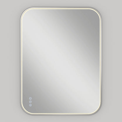 A rectangular, wall-mounted mirror with rounded corners, illuminated by a soft, built-in LED light around the edges, and three touch control buttons in the lower left corner.