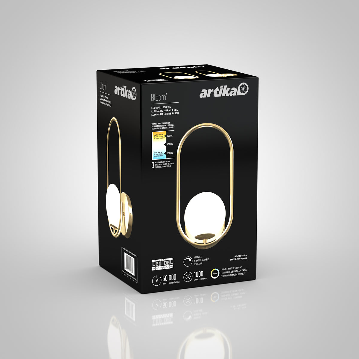 Black and gold box packaging for an Artika Bloom LED table lamp, featuring an image of the lamp with a glowing spherical bulb encased in a gold oval ring. Product specs and energy ratings are visible on the side.