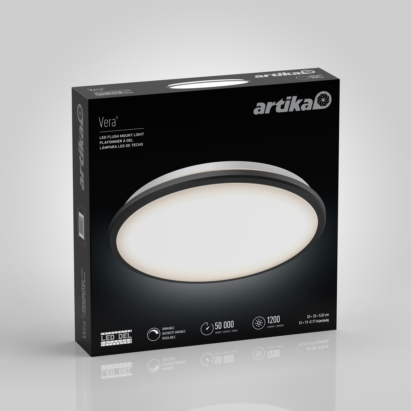 A box of Artika-CAN-dev Vera 13 in. LED modern flush mount light features a round matte black fixture. The packaging highlights 1200 lumens, a 50,000-hour lifespan, and LED dimmer compatibility for adjustable lighting.