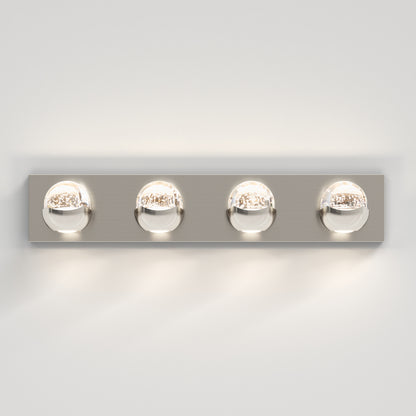 The Artika Oracle 4 light LED bathroom vanity light features four round clear glass bulbs on a sleek rectangular base, providing soft illumination for your space.