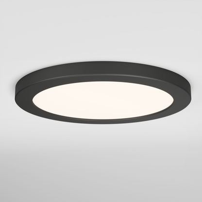 A round, modern black ceiling light fixture with a smooth frame and a diffused white light, mounted on a white ceiling.