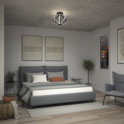 Modern bedroom with a gray upholstered bed, white and gray bedding, minimalist art, a Meridian LED flush mount light by Artika, gray chair, potted plant, striped rug, and light wooden flooring.