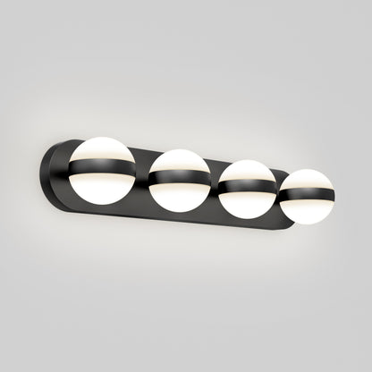 The Artika Baldric LED modern bathroom vanity light features four frosted glass globes on a sleek black horizontal base, each globe accented with a black band, emitting a soft, even glow. Choose from 3 CCT options for versatile lighting.