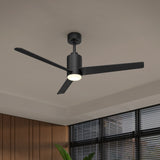 A modern black ceiling fan with three blades and an integrated light fixture is mounted on a white ceiling. The room features wood paneling and large windows with horizontal blinds.