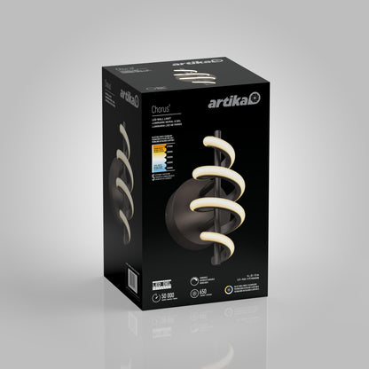 The packaging of the Artika Chorus LED Wall Light features the black, spiral-shaped fixture along with energy consumption details and specifications, all displayed on a grey background.
