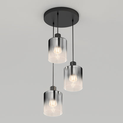 The Artika Haze modern 3-light pendant features three cylindrical glass shades suspended from a round black base, creating a sleek ceiling fixture ideal for contemporary spaces.