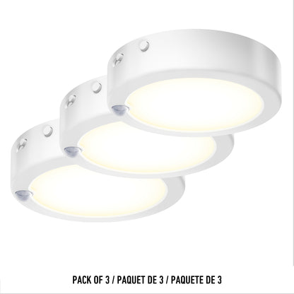 Three round Accent under cabinet LED lights (3CCT) by Artika are displayed in a staggered arrangement on a white background. Text below reads: PACK OF 3 / PAQUET DE 3 / PAQUETE DE 3.