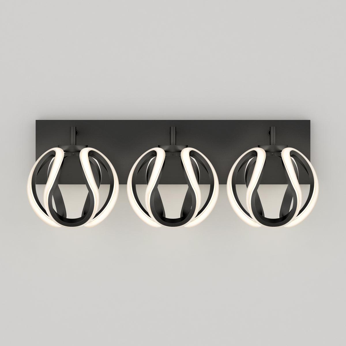 A modern wall-mounted light fixture with three spherical LED lights, each encased in a black and white looped design, set against a rectangular black base on a light gray background.