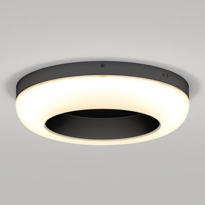The Artika-CAN-dev Louka 15 in. modern LED flush mount light features a black center and glowing white ring for a striking halo effect on light gray ceilings, with adjustable brightness and 5 CCT options to set the perfect mood in any room.
