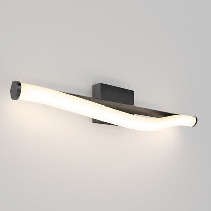 The Artika Arc modern LED bathroom vanity light 5 CCT features a sleek, curved white tube and black rectangular base, wall-mounted against a plain light gray background.