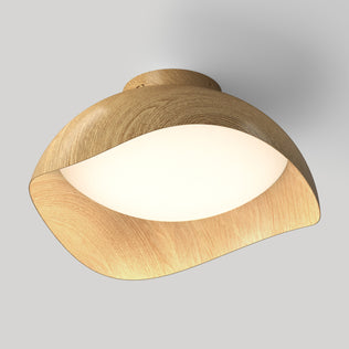 Adara 15 in. (38 cm) Modern LED Flush Mount Ceiling Light 5 CCT with a curved, light-toned wood-look frame and a circular white LED light panel.