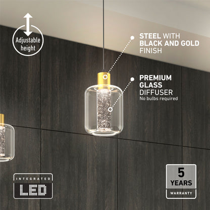 The Artika Champagne Globe modern LED pendant light features a black and gold steel finish, premium glass diffuser, adjustable height, integrated LED, and 5-year warranty. Shown against a dark wood wall.