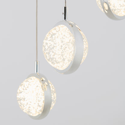 The Artika Avalon 4-light LED pendant features modern, round frosted glass shades with a bubbly texture, suspended by thin cords against a light gray background.