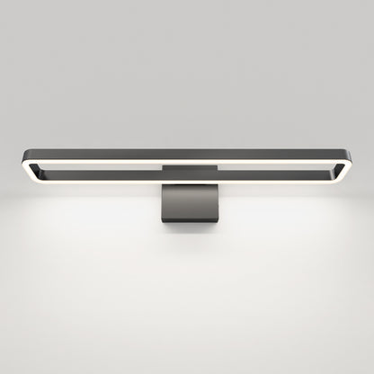 The Artika Hinge LED modern bathroom vanity light features a rectangular black frame and emits a soft, even glow upward and downward, adding minimalist, contemporary style to any white wall.