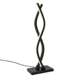 A modern table lamp with two intertwined, black curved bars featuring an integrated LED light strip, standing on a rectangular black base with a power cord extending from it.