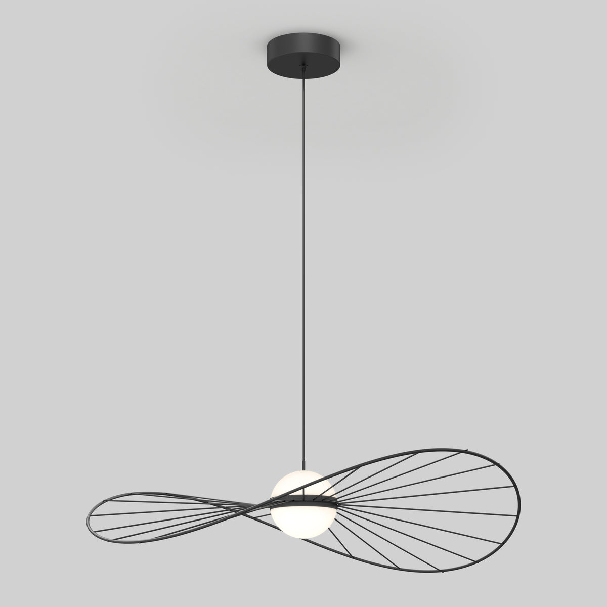 The Artika Tolena LED pendant light 3 CCT features a modern black wireframe design resembling an infinity symbol, suspended by a black cord and centered with a round white bulb.