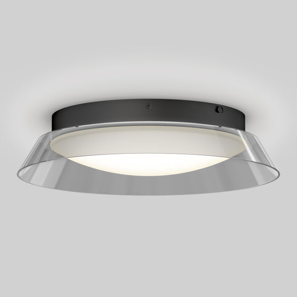 The Artika Arthur modern LED flush mount light 5 CCT features a black circular base, white diffuser, and clear outer rim. Mounted on a light gray ceiling, it emits a soft, even glow for contemporary spaces.