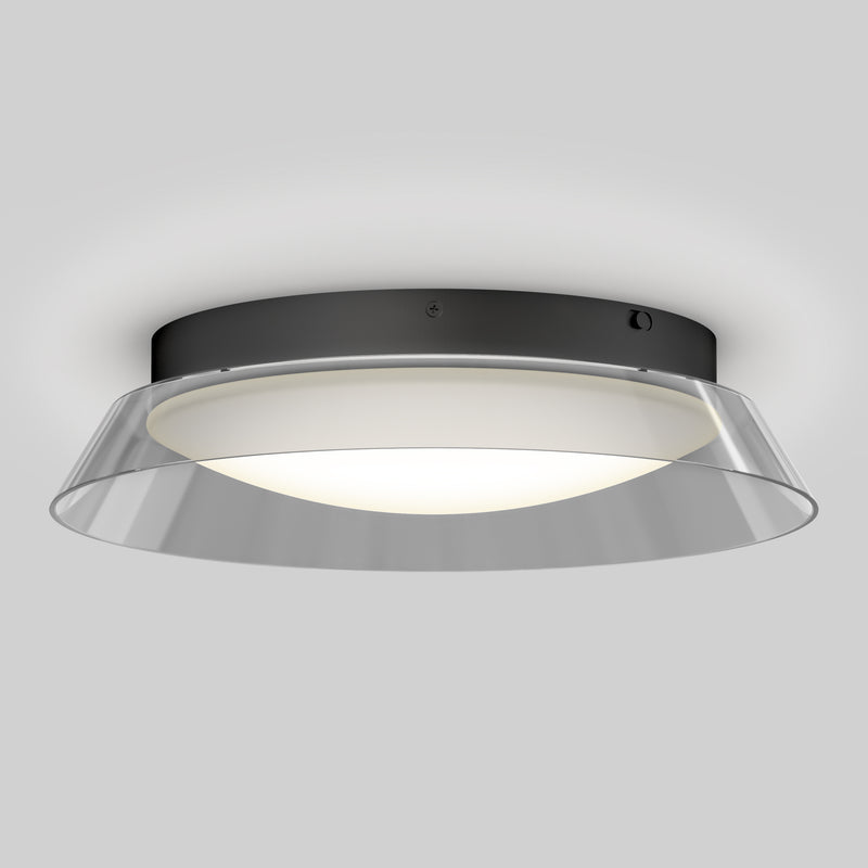 The Artika Arthur modern LED flush mount light 5 CCT features a black circular base, white diffuser, and clear outer rim. Mounted on a light gray ceiling, it emits a soft, even glow for contemporary spaces.