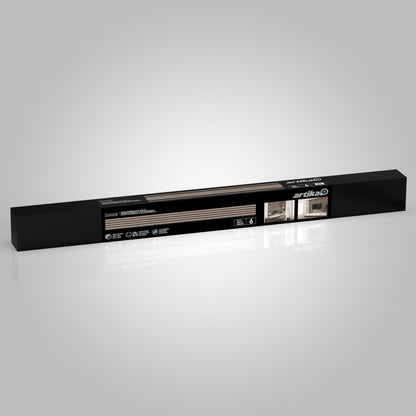 A long, rectangular black Artika box labeled “Sonolok sound-absorbing wall panel kit” features images of a kitchen and living room, suggesting it contains materials for home improvement and acoustic enhancement.