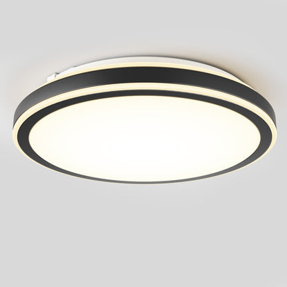 The Artika Altitude 15 in. LED modern flush mount light features a black outer ring, bright white frosted center, and is mounted on a light gray ceiling. Offers 5 CCT options for customizable lighting.