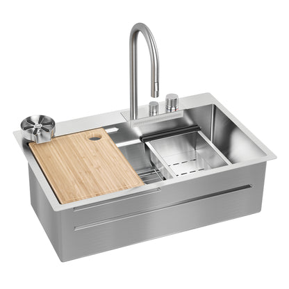 The Artika Neoflow single bowl stainless steel sink features a tall faucet, built-in soap dispensers, metal strainer, drying rack, and a wooden cutting board that partially covers the sink.