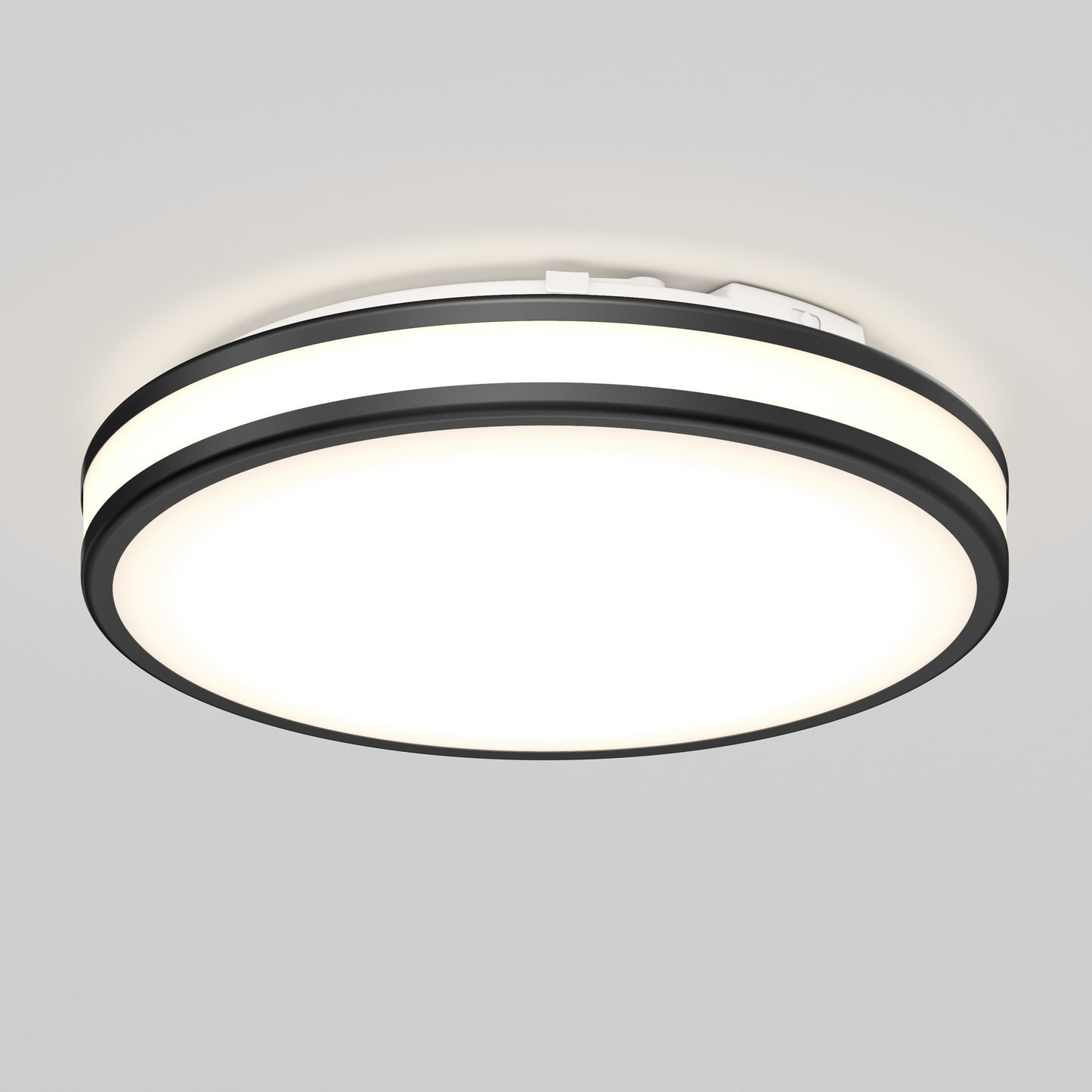 The Artika Hemisphere 15 in. LED flush mount light features a black outer ring, bright white center, and 5 selectable color temperatures. Adjustable brightness makes it ideal for stylish bathroom lighting on a light gray ceiling.