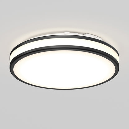 The Artika Hemisphere 15 in. LED flush mount light features a black outer ring, bright white center, and 5 selectable color temperatures. Adjustable brightness makes it ideal for stylish bathroom lighting on a light gray ceiling.