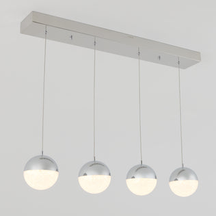 The Artika Sparkle 4-light LED pendant features four spherical, chrome-finished lights with frosted lower halves, arranged in a row on a rectangular metal base for a modern ceiling fixture.
