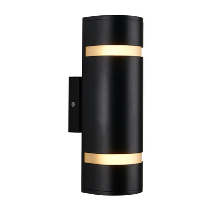 The Artika D4 indoor-outdoor wall light is a modern black cylindrical sconce with two horizontal openings, emitting warm light from both the top and bottom, shown mounted on a white background.