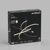 A black box displays the Artika Silvio LED light pendant, showing a modern, curved design with three illuminated arms. The box features product details and icons, set against a gray background.
