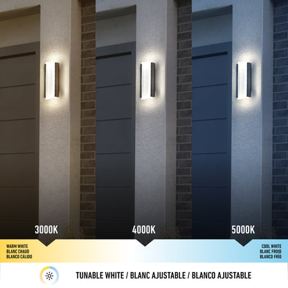 The Artika Blade indoor-outdoor LED wall light is displayed in three color temperatures—3000K warm white, 4000K neutral white, and 5000K cool white—each lighting a garage exterior with a unique ambiance.