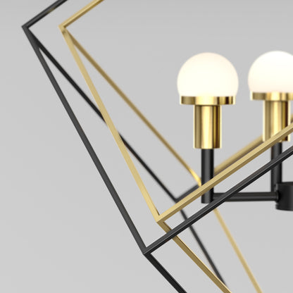 Close-up of the Artika Peyton LED modern mid-century pendant light, highlighting gold and black angular metal lines with two round frosted globes on gold cylindrical bases against a light gray background.