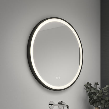 Artika Mateo 28″ LED mirror with 3 CCT, defogger, lit frame above sink; small plant seen on the right.