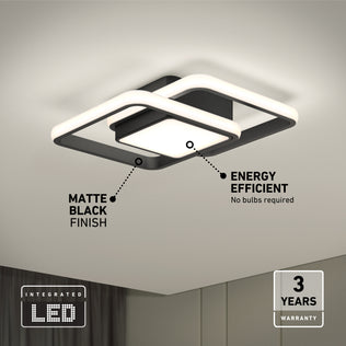The Artika Romeson 11 in. LED modern flush mount light offers 5 CCT, an energy-efficient design, integrated LEDs with no bulbs required, a matte black finish, and a 3-year warranty—shown mounted on a white ceiling.