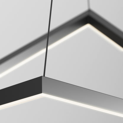 Close-up of the Artika Artemis LED pendant light 3 CCT, featuring a modern geometric design with a black frame and integrated LED strip, suspended by thin wires against a white or light gray ceiling.