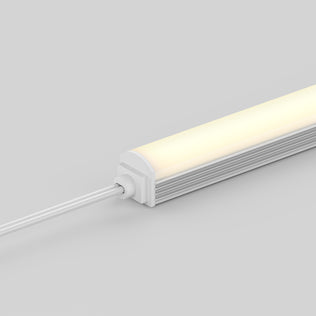 A close-up of the Artika Lumilok LED Wall Panel Light with Remote for Sonolok, glowing warmly against a light gray background.