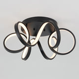 A modern ceiling light fixture with black curved metal loops and integrated LED strips, arranged in an artistic, abstract pattern against a plain light gray background.