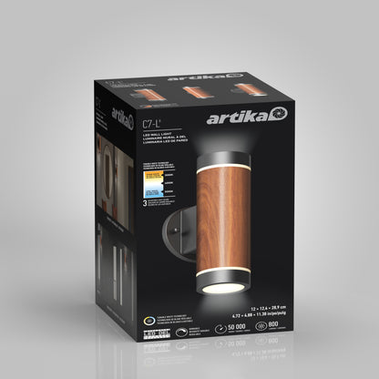 A black box showcases the Artika C7 indoor-outdoor LED wall light 3 CCT, featuring a cylindrical wood-and-metal design. The packaging highlights key features, adjustable color temps, lifespan, brightness, and shows the mounted light.