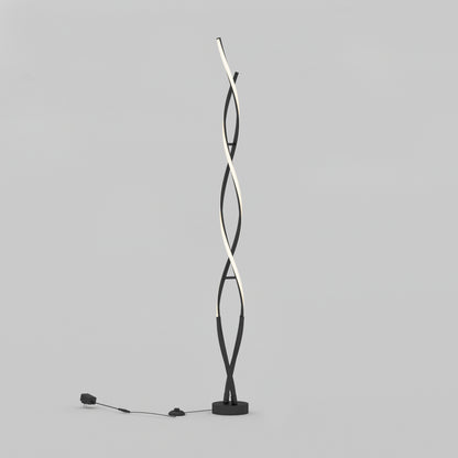 The Artika Swirl modern LED floor lamp features two intertwined wavy light strips on a circular black base, with the power cord and plug visible on the left side against a plain light gray background.