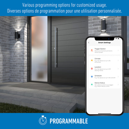 A sleek house entrance lit by Artika’s Stark modern LED indoor-outdoor lights with wi-fi. In the foreground, a smartphone shows settings for custom use in English and French via the smart home app.