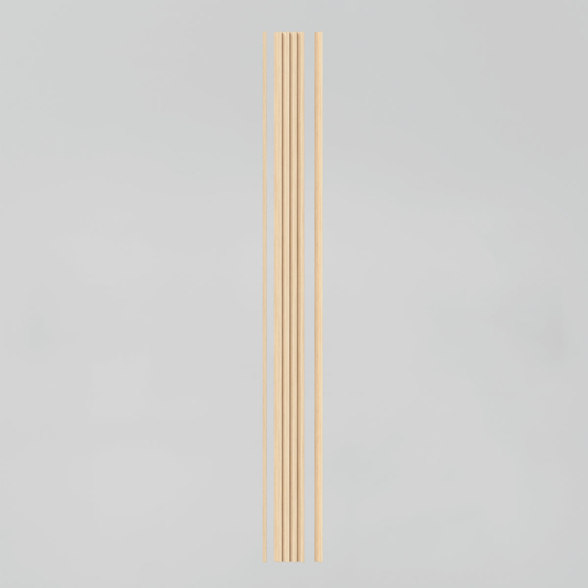 Five light wooden chopsticks are arranged vertically on a plain, light gray background. The chopsticks are evenly spaced and aligned in a straight row.