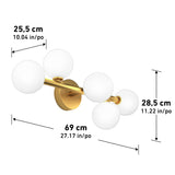 A modern gold wall sconce with five round white globes, measuring 69 cm wide, 25.5 cm deep, and 28.5 cm tall. Metric and imperial measurements are labeled with black arrows and text.