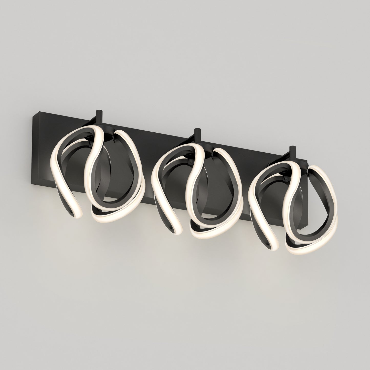The Artika Vivaldi LED contemporary bathroom vanity light 3 CCT features three sculptural looped LEDs on a rectangular black base, showcased against a plain light gray background.