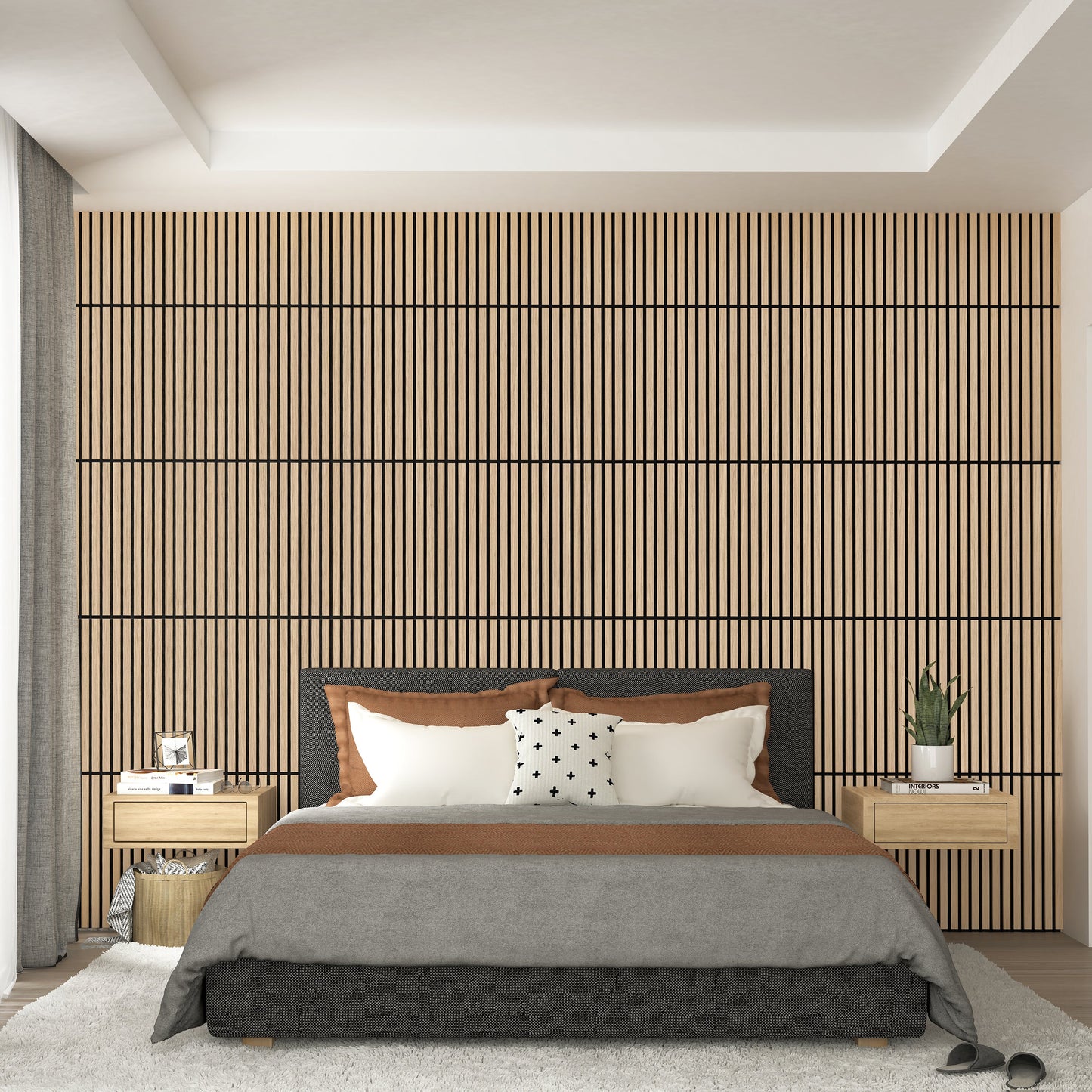 A modern bedroom with a gray and brown bed, two wooden nightstands, a plant, and a decorative pillow. Behind the bed, Artika-CAN-devs Sonolok 15.5 ft sound-absorbing wall panel kit adds a stylish vertical accent.