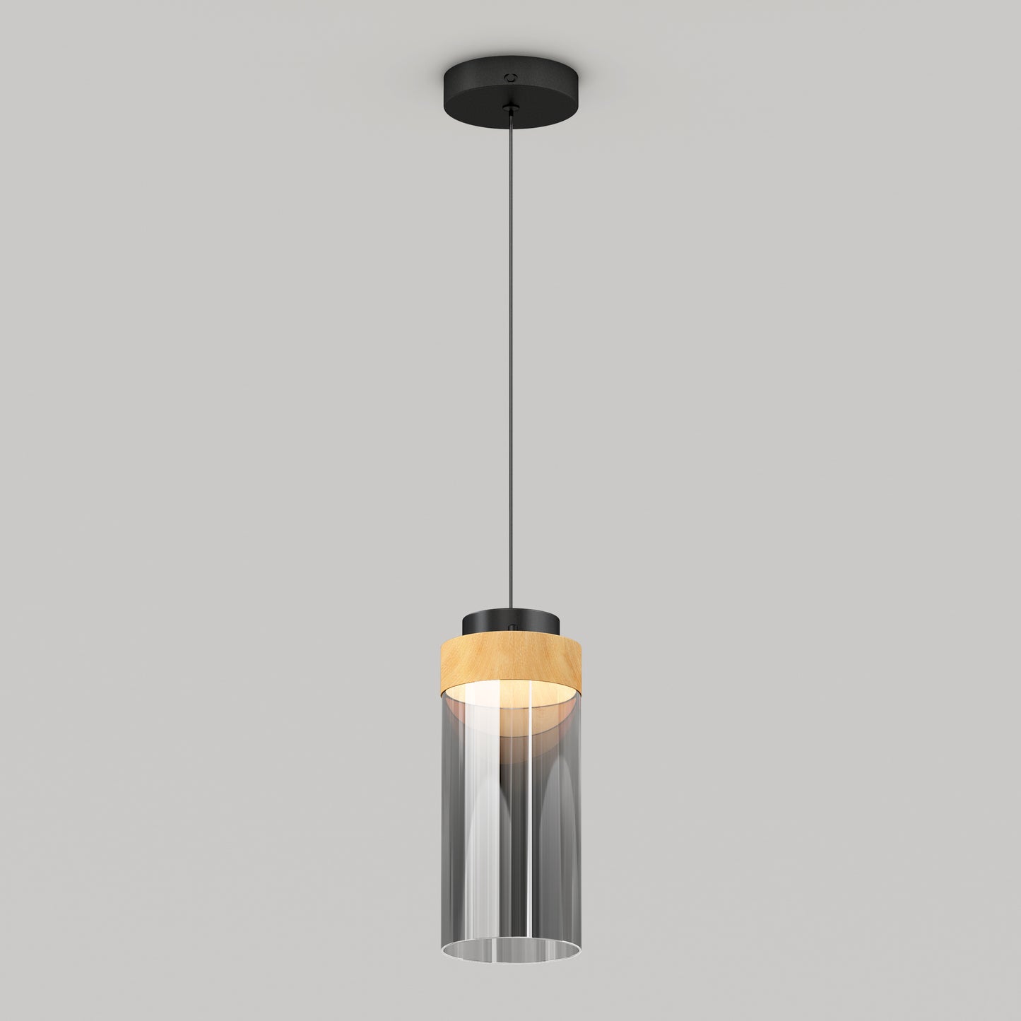 The Artika Hanson 1-light LED pendant 5 CCT features a black ceiling mount, black cord, cylindrical glass shade with a wooden accent on top, and emits a soft glow when illuminated.